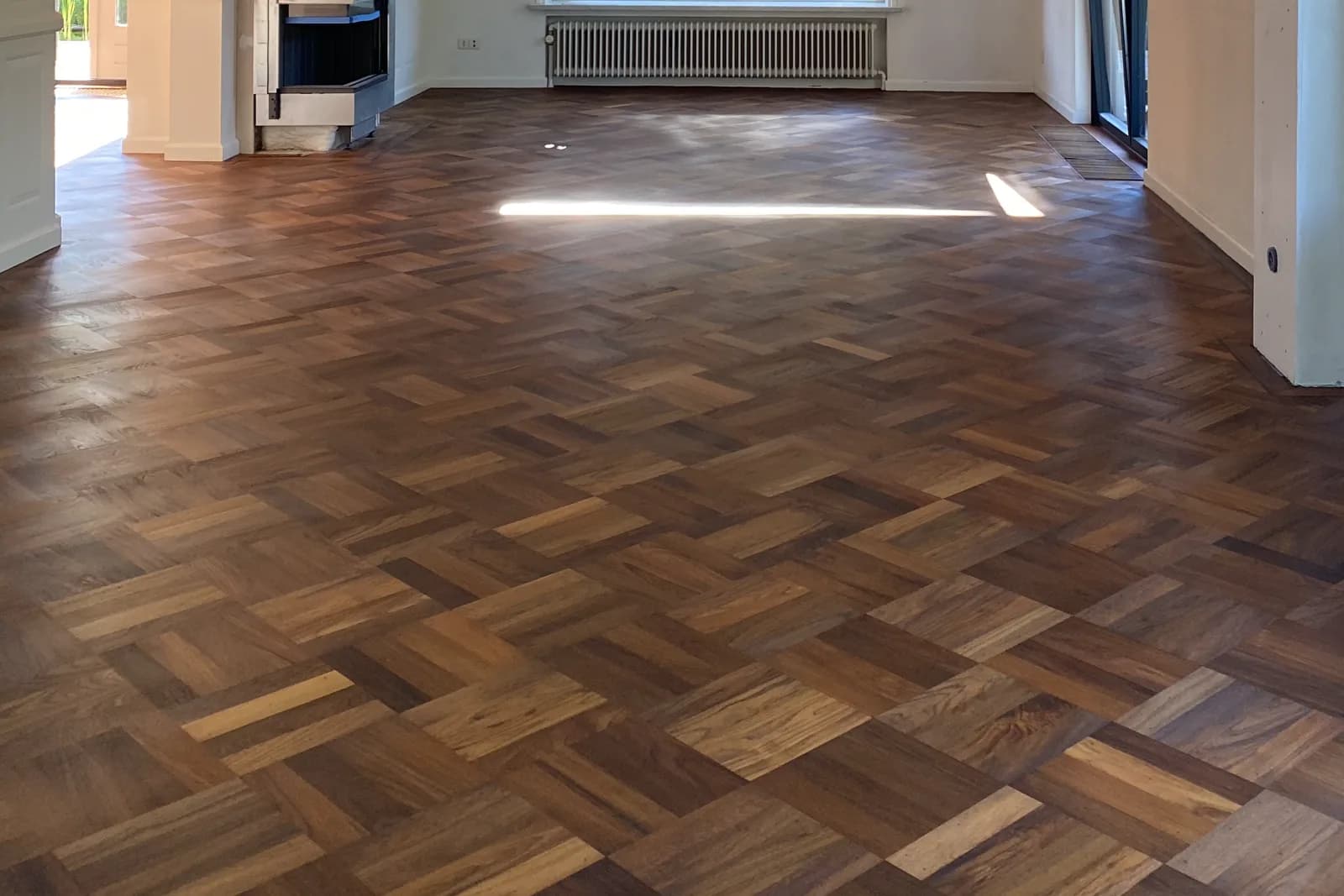 Blokpatroon parketvloer in teak