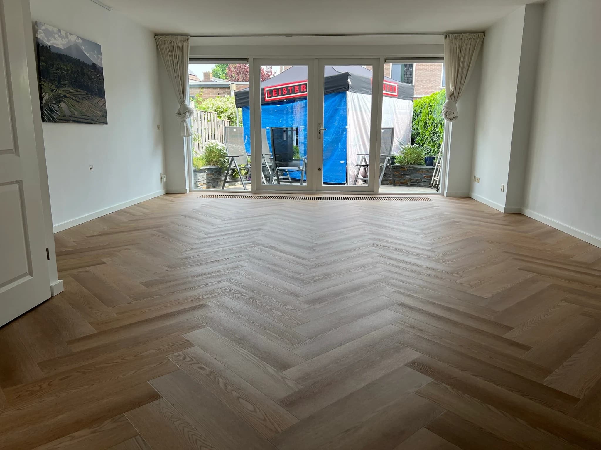PVC-visgraat in eiken-look met tuindeuren, Vianen